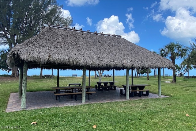 view of property's community featuring a yard and a gazebo