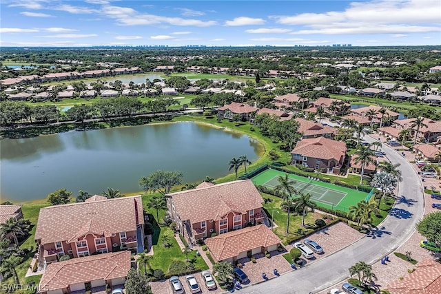 bird's eye view with a water view