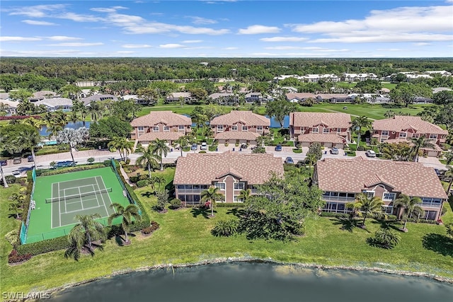 drone / aerial view with a water view