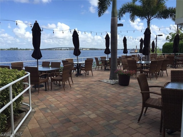 view of patio / terrace featuring a water view