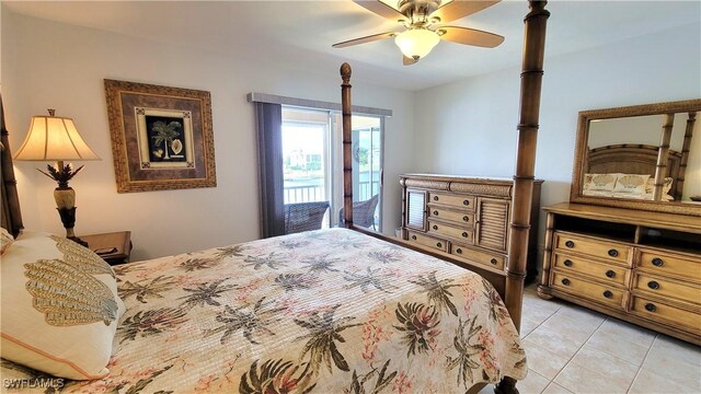 bedroom with ceiling fan, light tile patterned floors, and access to outside