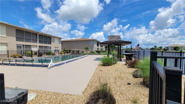 view of swimming pool with a patio