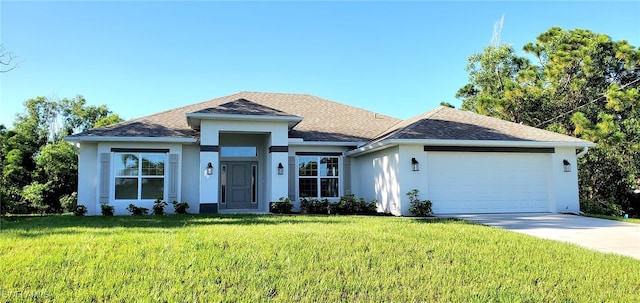 ranch-style house featuring a garage and a front yard