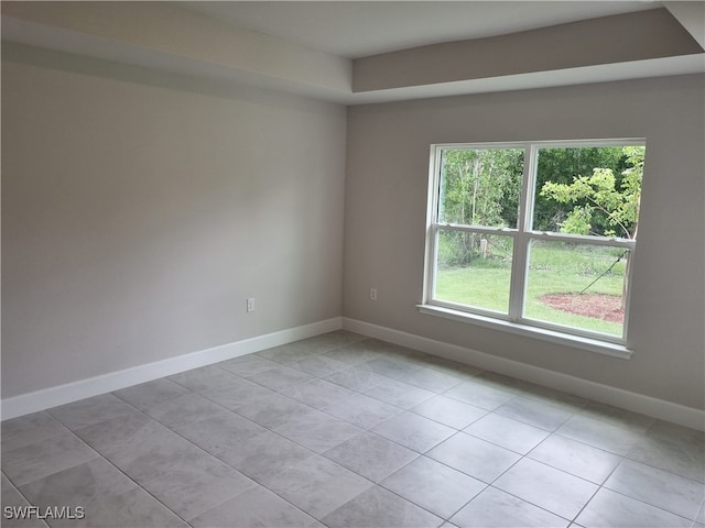 empty room featuring light tile patterned flooring