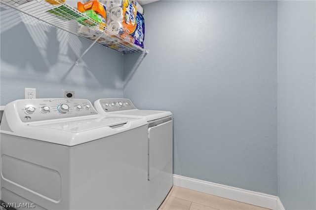 laundry area with washer and clothes dryer