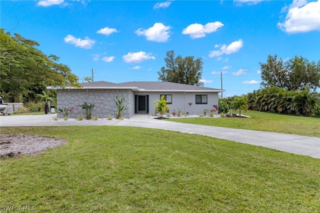 view of front of property with a front lawn