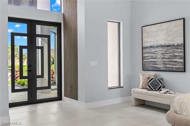 tiled entryway with french doors