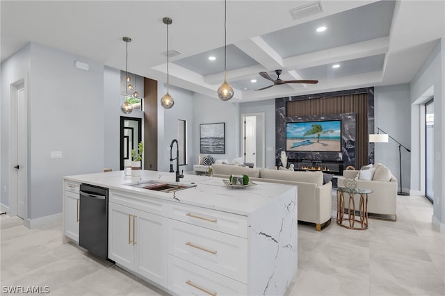 kitchen featuring ceiling fan, a kitchen island with sink, sink, coffered ceiling, and dishwasher