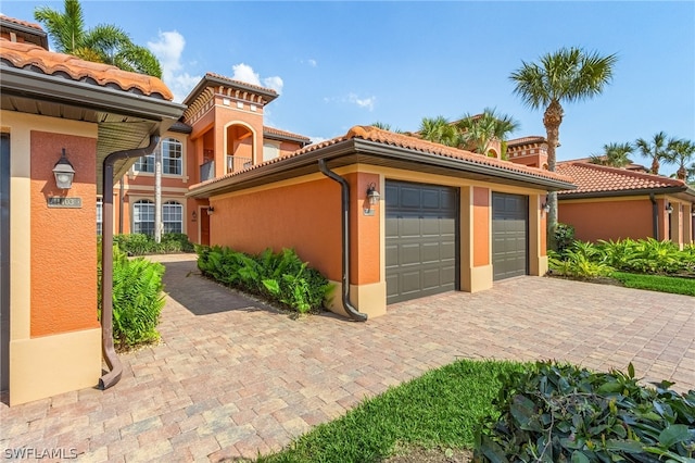 view of property exterior with a garage