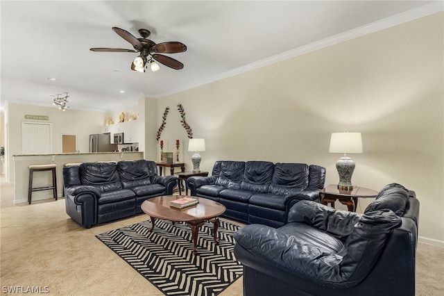 tiled living room with crown molding and ceiling fan