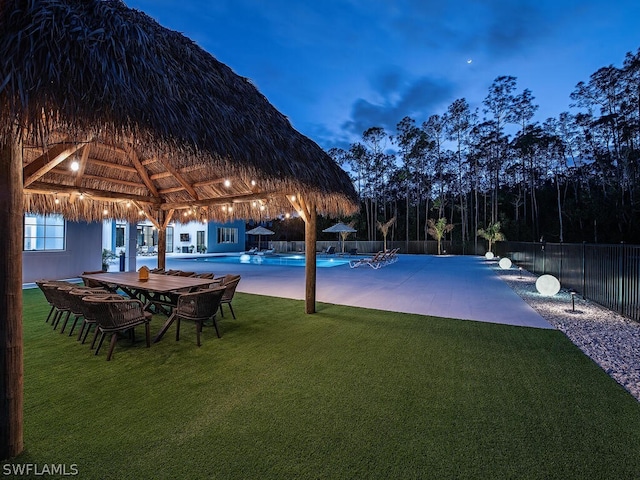 exterior space with a yard, a patio area, and a gazebo