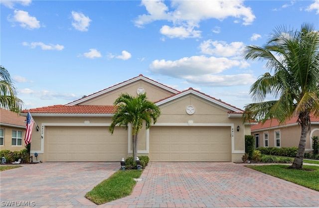 view of front of property with a garage