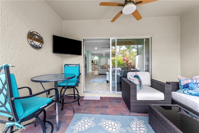 view of patio featuring ceiling fan and an outdoor hangout area