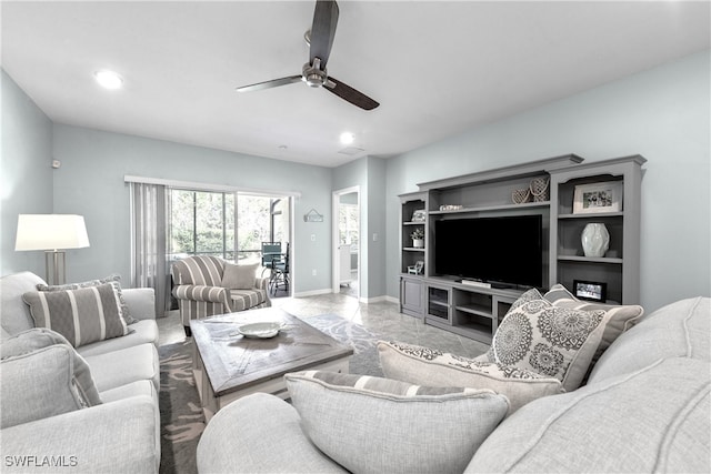 living room featuring ceiling fan