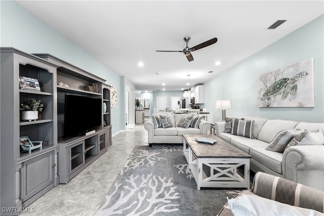 living room with ceiling fan