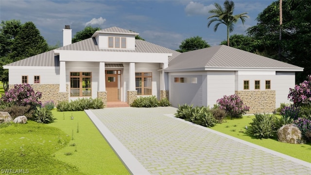 modern inspired farmhouse featuring a porch and a front yard