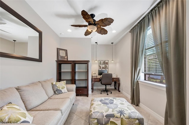 tiled living room with ceiling fan