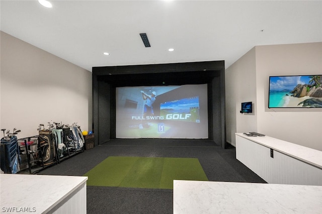 game room with golf simulator and dark colored carpet