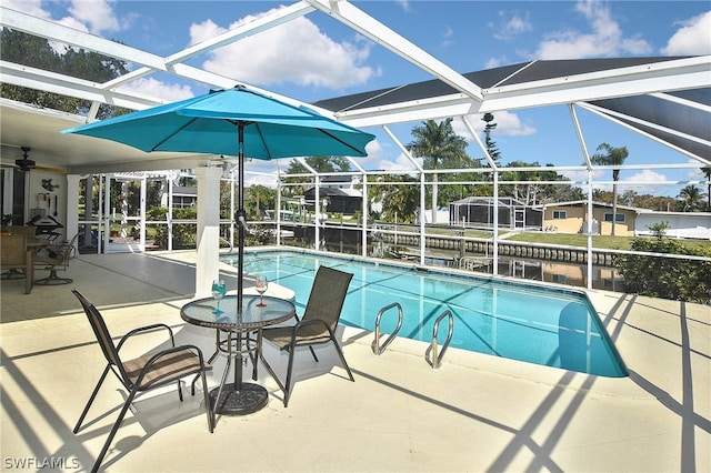 view of pool featuring a lanai and a patio