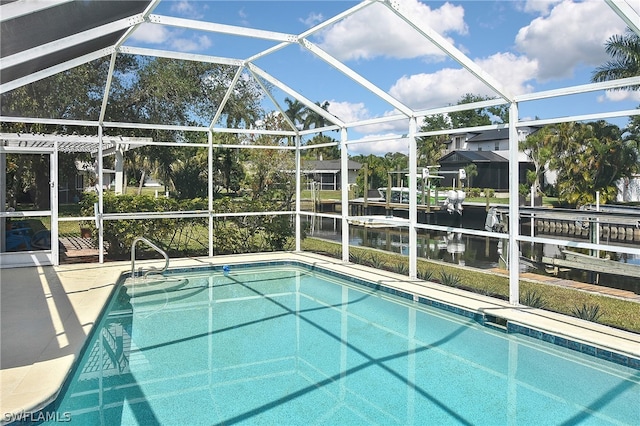 view of pool with a dock and a lanai