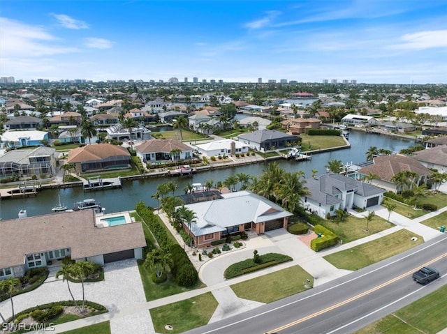 drone / aerial view with a water view