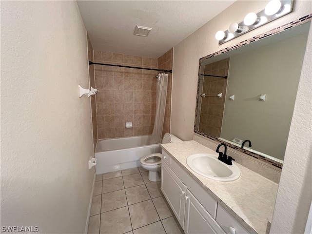 full bathroom with toilet, oversized vanity, a textured ceiling, tile flooring, and shower / tub combo