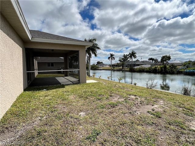 view of yard with a water view