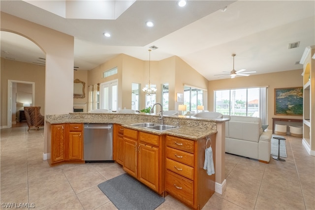 kitchen with sink, dishwasher, light tile flooring, light stone countertops, and ceiling fan with notable chandelier