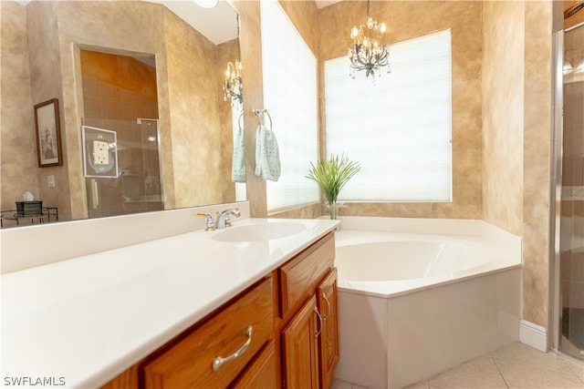 bathroom featuring separate shower and tub, tile floors, a notable chandelier, and large vanity