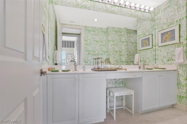 bathroom featuring vanity and tile patterned flooring