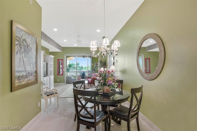 dining area featuring a notable chandelier