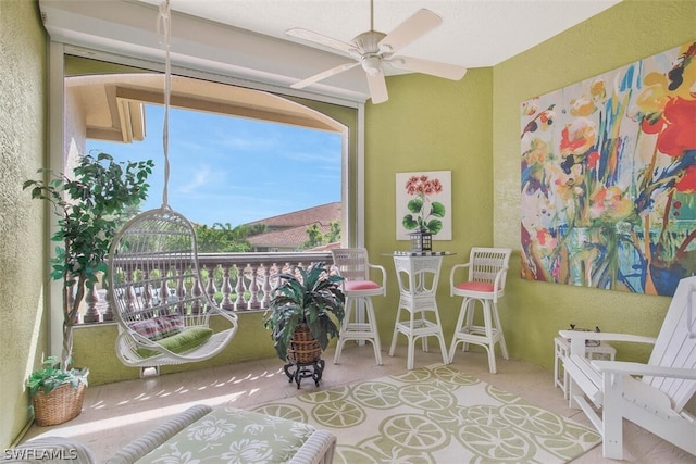 interior space featuring ceiling fan