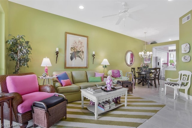 living room featuring ceiling fan with notable chandelier