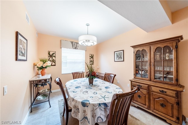 view of tiled dining space