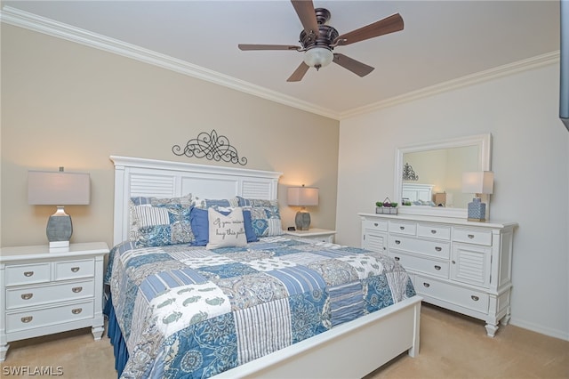 carpeted bedroom with ornamental molding and ceiling fan