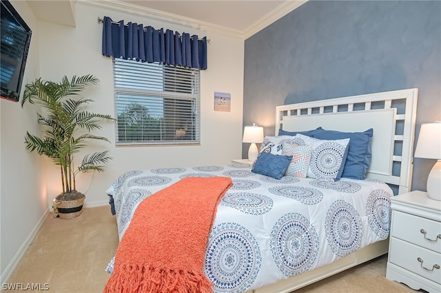 carpeted bedroom featuring crown molding