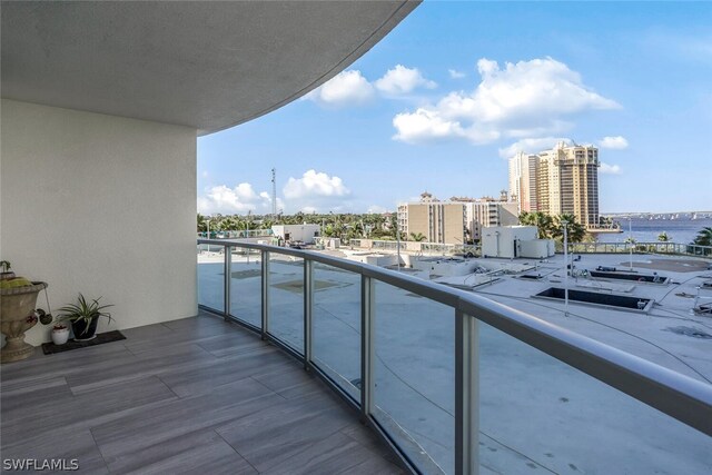 balcony featuring a water view