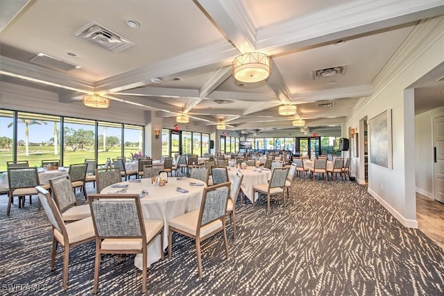 carpeted dining area with ornamental molding, coffered ceiling, a healthy amount of sunlight, and beam ceiling