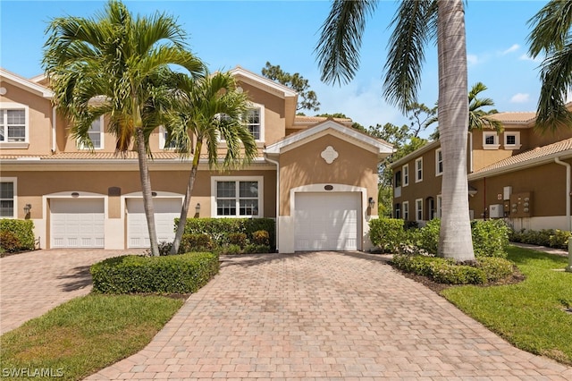 view of front of home with a garage