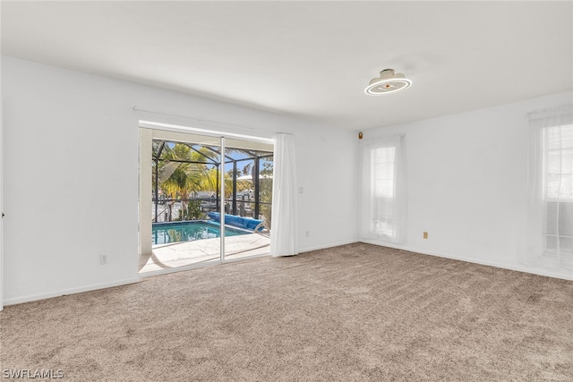 view of carpeted spare room