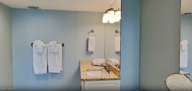 bathroom featuring oversized vanity