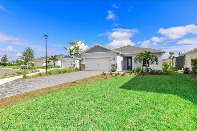 ranch-style home with a garage and a front lawn