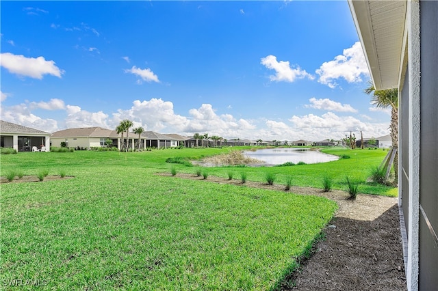 view of yard with a water view