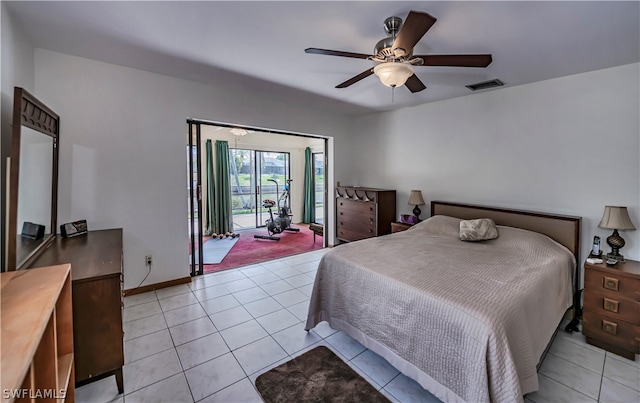 bedroom featuring light tile floors, access to outside, and ceiling fan