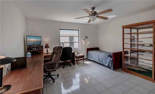 bedroom with light tile floors and ceiling fan