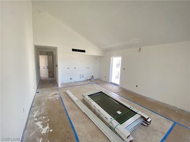 interior space with high vaulted ceiling