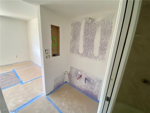 bathroom featuring walk in shower