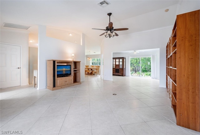 unfurnished living room with ceiling fan and light tile floors