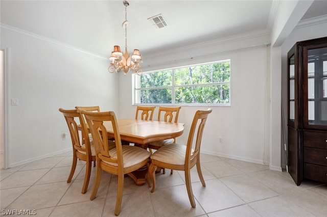 dining room featuring a notable chandelier, crown molding, and light tile floors