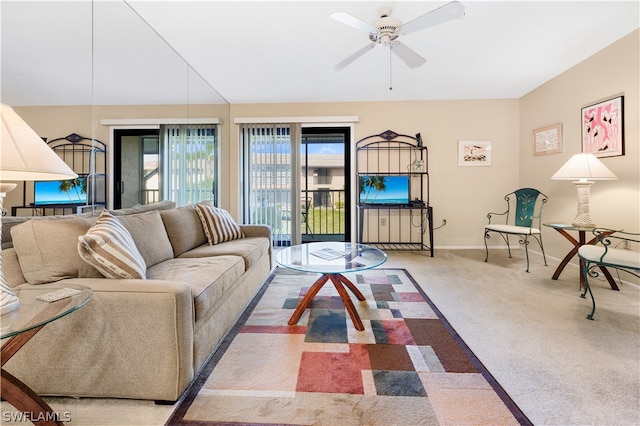 living room featuring light carpet and ceiling fan